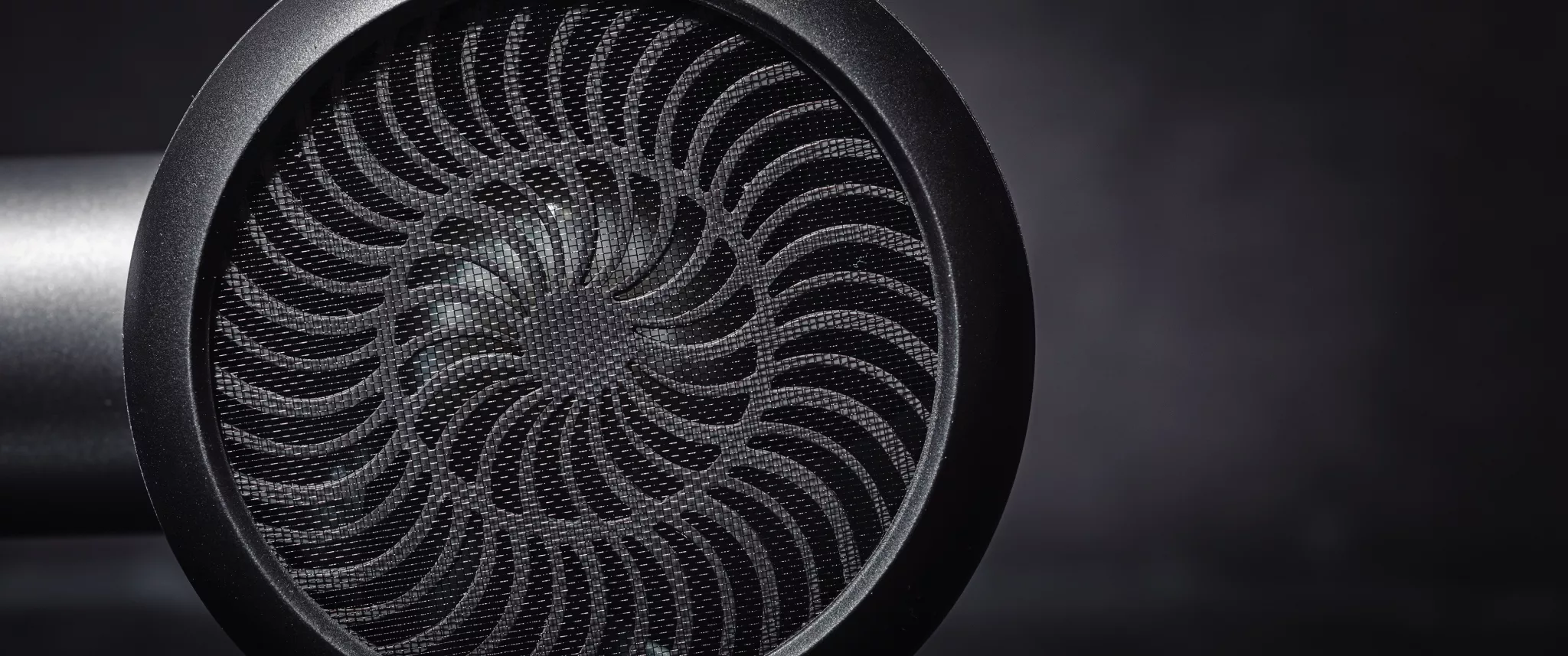 A zoomed in image of the top of a hair dryer.